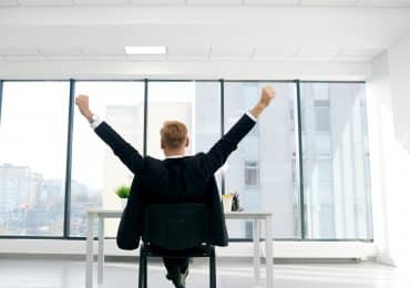 Businessman dreaming about the future. Man in business suit